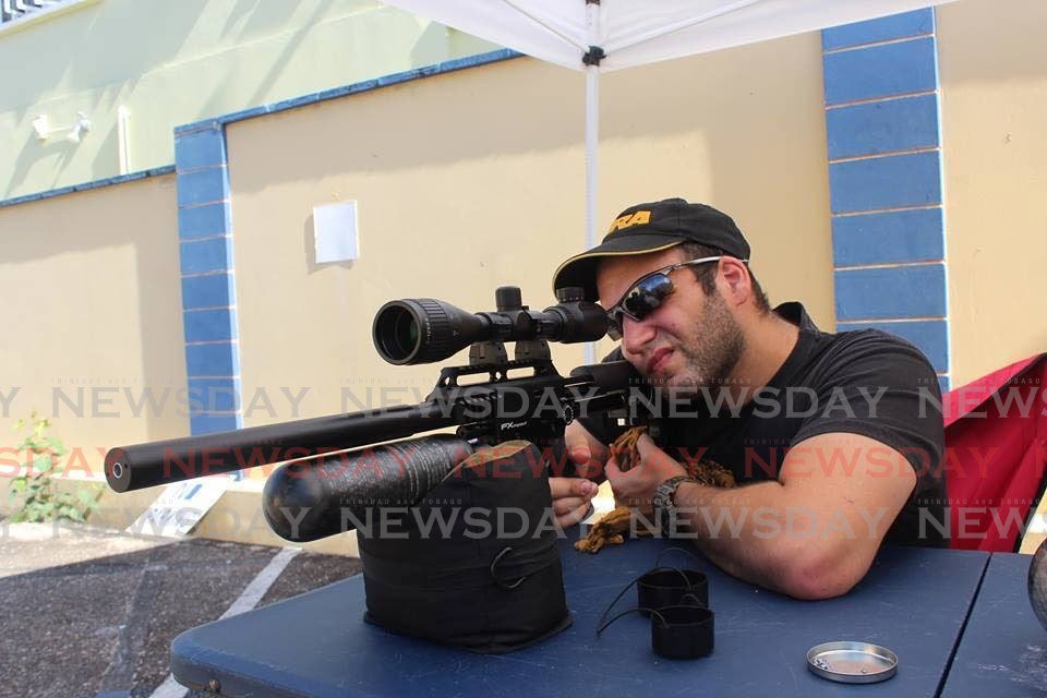 Law enforcement consultant Paul Nahous during a shooting tournament in 2019. - Photo by Shane Superville