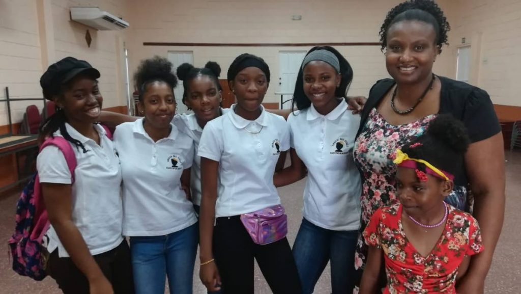 Some of the participants with Simone Claxton, founder of the Sapphire Miriam Foundation, at a 2019 girls empowerment programme held at National Energy Skills Centre (NESC) in La Brea. - 