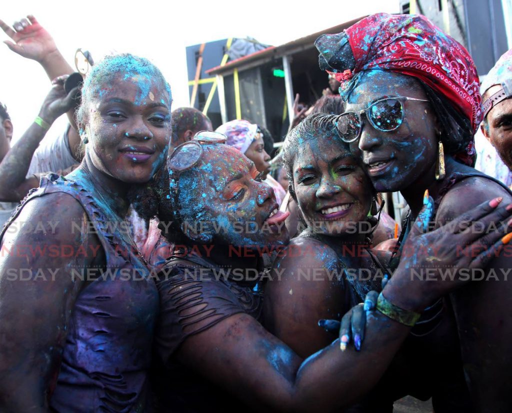 In this 2018 file photo, revellers from the band Dutty enjoy themselves on J'Ouvert morning. The furious backlash over J’Ouvert Rum is myopic and has made us poorer. - 