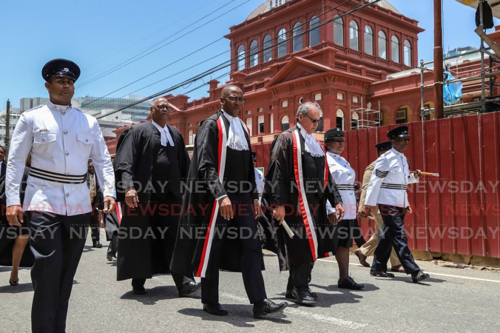 In this 2019 file photo, Chief Justice Ivor Archie, Justice of Appeal Allan Mendonca, and Dr Barry Ishmael, administrative secretary to the CJ are among members of the judiciary who walk from Trinity Cathedral to the Hall of Justice in Port of Spain during the ceremonial opening of the law term. - 