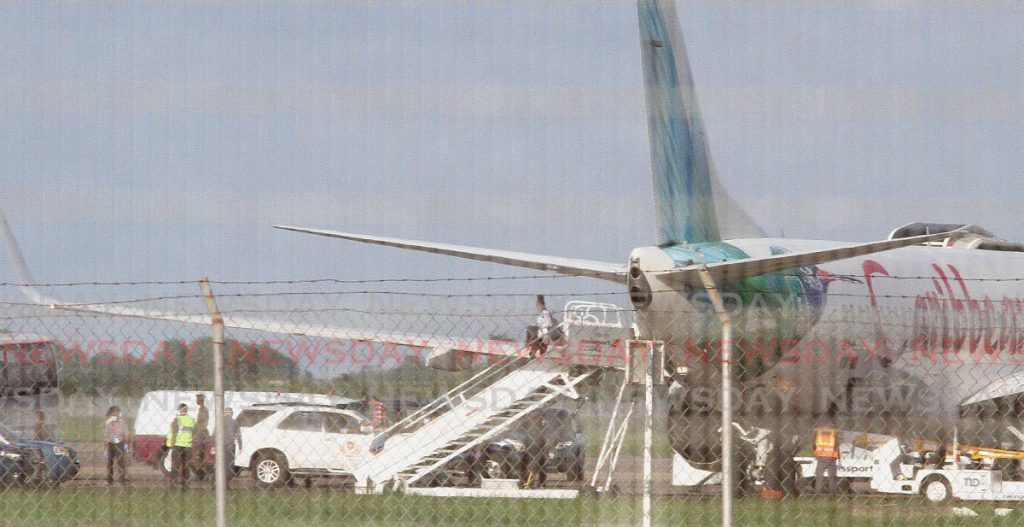 In this file photo, students from UWI Mona campus, Jamaica, disembark a Caribbean Airlines flight at the Piarco International Airport in June 2020. - Angelo M. Marcelle