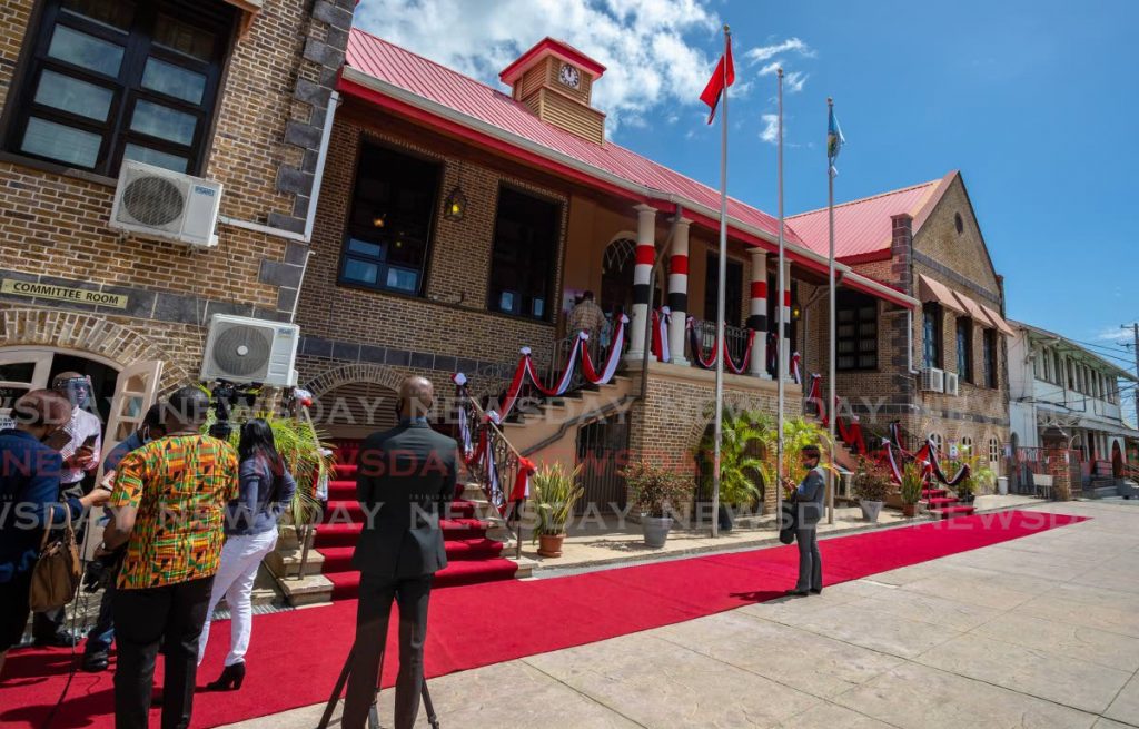 In this January 28, 2021 file photo members of the media await the assemblymen to exit the Tobago House of Assembly building in Scarborough. A six-six deadlock in the election led Government to pass legislation to increase the seats to 15, setting the stage for a new election by 2022. - 