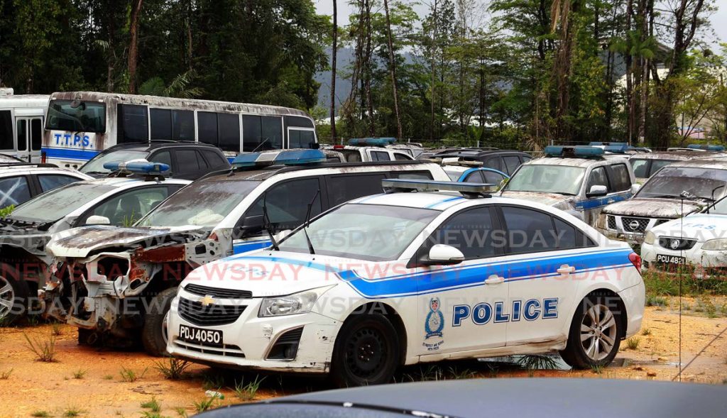 A decommissioned squad car at the police impound lot in Cumuto. File photo - 