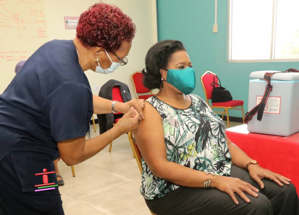 President Paula-Mae Weekes receives her second dose of the AstraZeneca vaccine at the Queens Park Savannah's Paddock on June 7. PHOTO COURTESY OFFICE OF THE PRESIDENT - 