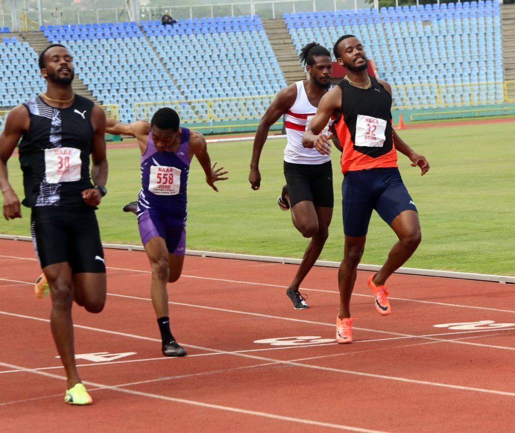 In this June 20, 2021 file photo, Johanthan Farinha (far left)  winning the men's second finals of the 100-metre sprint at the NAAA trials, at the Hasely Crawford Stadium, Mucurapo. On his  right is Omari Lewis, Nathan Farinha, and Khaliyq Abdullah. - SUREASH CHOLAI