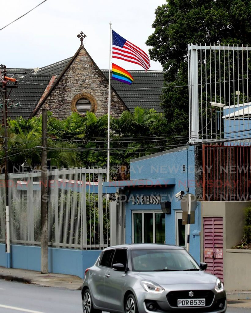 The Pride flag flies alongside the US flag in celebration of Pride Month at the US Embassy in Port of Spain. Photo by Sureash Cholai - SUREASH CHOLAI