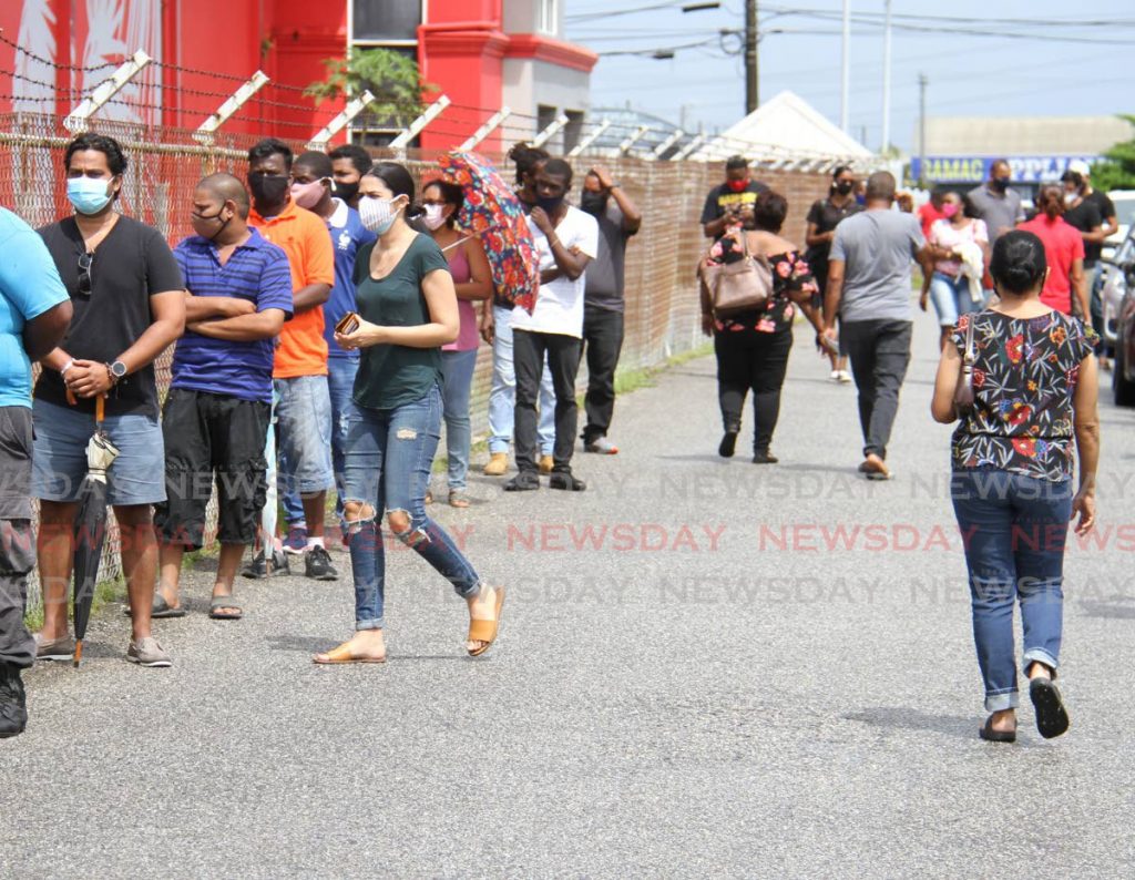 People awaiting vaccination at UTT in Chaguanas. Photo by Ayanna Kinsale - AYANNA KINSALE