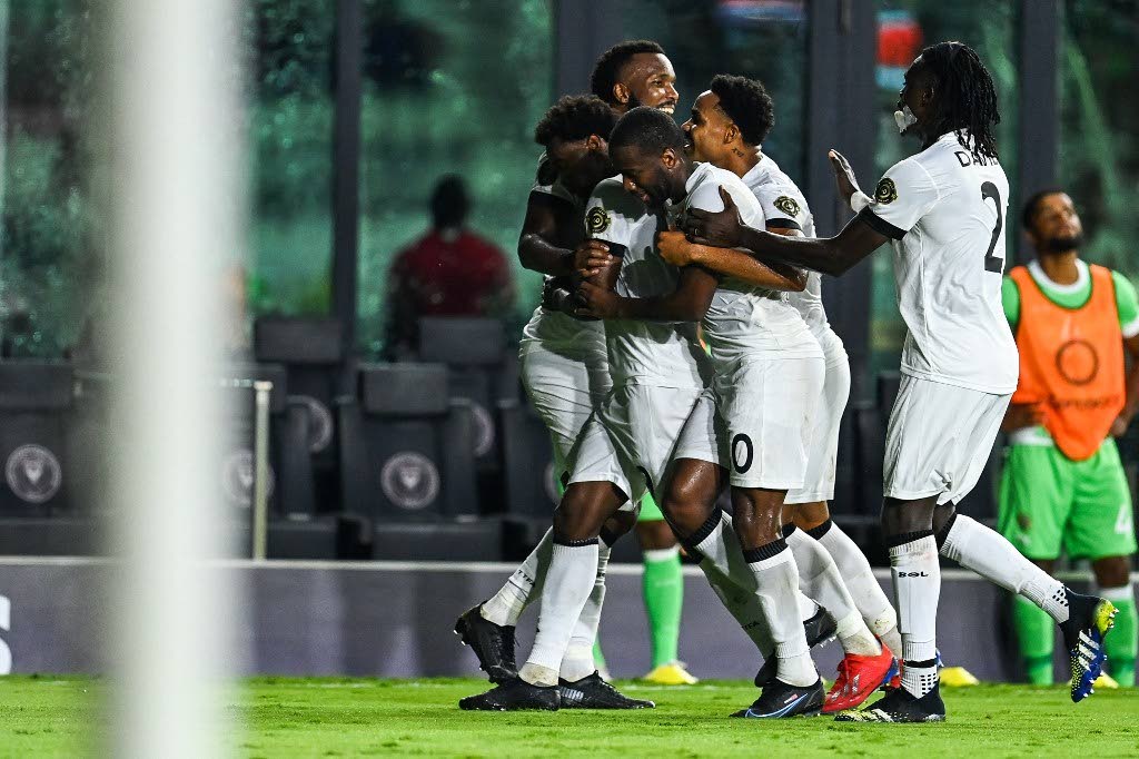 Trinidad and Tobago's players celebrates after scoring a goal against Montserrat during the Gold Cup Prelims football match at the DRV PNK Stadium in Fort Lauderdale, Florida, on Friday. - (AFP PHOTO)