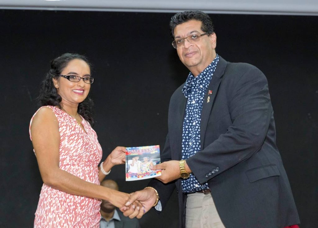 Member of Parliament for Mayaro, Rushton Paray, right, with Dr Radica Mahase at an autism book launch. - Sataish Rampersad
