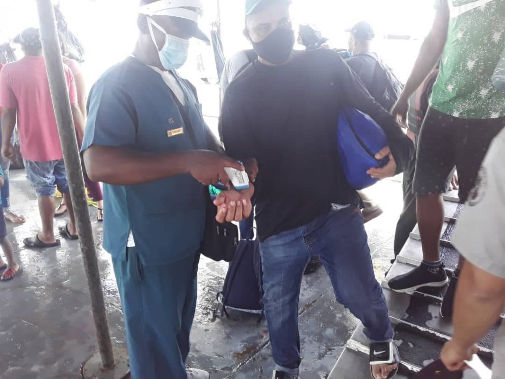 Medical personnel from the Guiria Military Hospital, Venezuela, traveled in the AB_Margarita71 boat to attend to the deportees from Port of Spain. - 