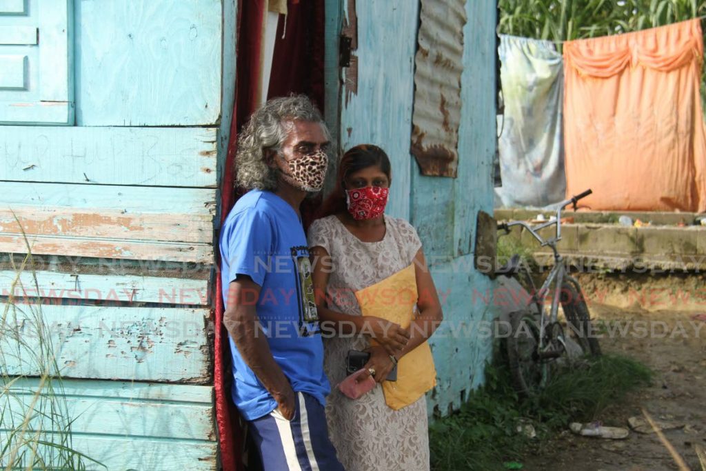 Kissondai Jaggasar and her husband Gangaram Ramcharan at their home on Railway Road, Longdenville, Chaguanas, on Monday. Photo by Ayanna Kinsale
