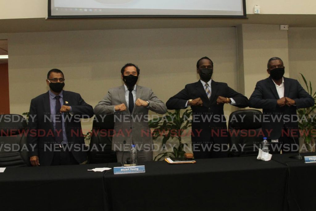 Ministers from left: Works and Transport Rohan Sinanan, Minister in the Office of the Prime Minister Stuart Young, National Security Fitzgerald Hinds and Digital Transformation Hassel Bacchus, all present at the press conference for the reopening of the Trinidad and Tobago borders at the Ministry of Works and Transport building, on London Street in Port of Spain on Wednesday.- Photo by Marvin Hamilton