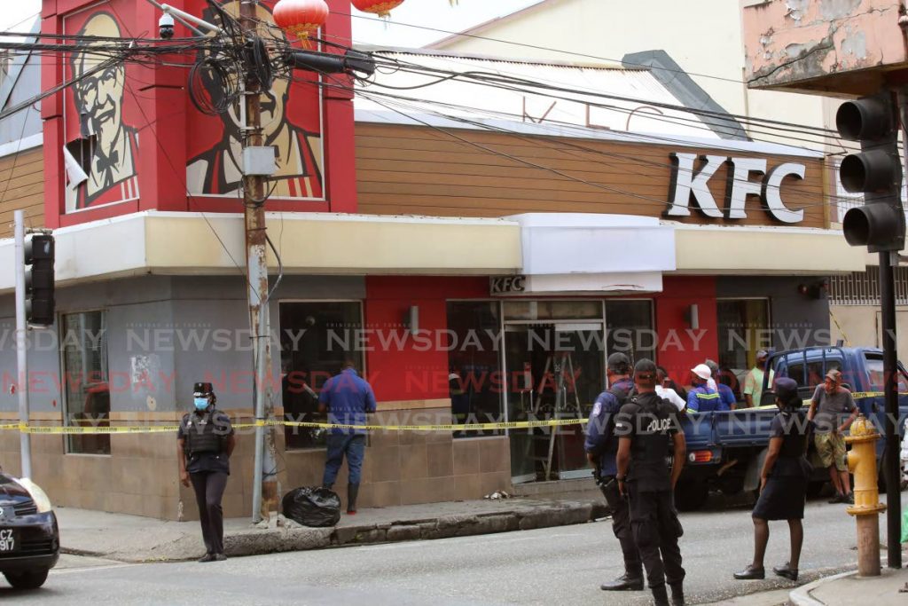 DAMAGED: The KFC outlet on Charlotte Street in Port of Spain which was badly damaged by a fire on Sunday morning. PHOTO BY SUREASH CHOLAI - 