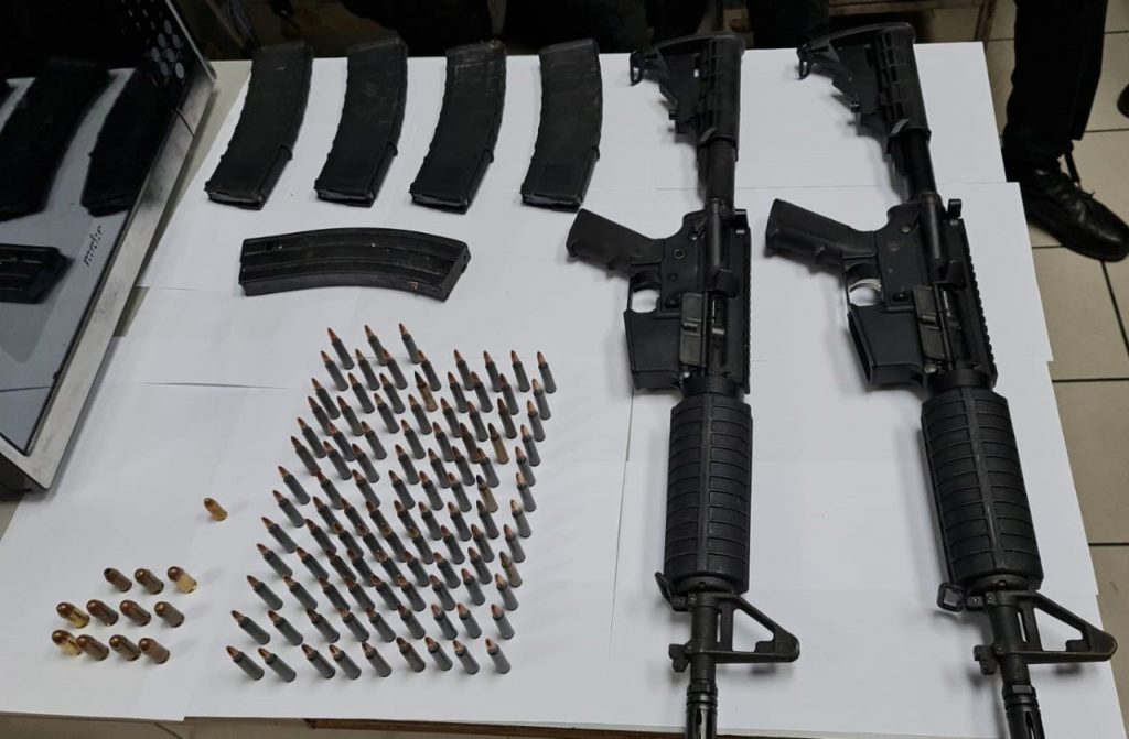 Two assault rifles and over 100 rounds of ammunition were found and seized in Kelly Village, Caroni, on Thursday afternoon. 
Police said one man was held in relation to the weapons. 

PHOTO COURTESY TTPS