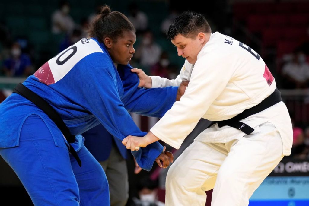 Gabriella Wood of Trinidad and Tobago, left, and Maryna Slutskaya of Belarus compete during their women's +78kg elimination round judo match at the 2020 Summer Olympics, Friday, in Tokyo, Japan. (AP Photo) - 