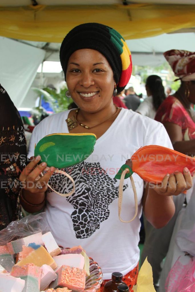 Quilin Achat shows of her leather craft mango bags at the Mango Festival, Harris Promenade, San Fernando in 2017. There will be no mango festival this year owing to the covid19 restrictions. - FILE PHOTO