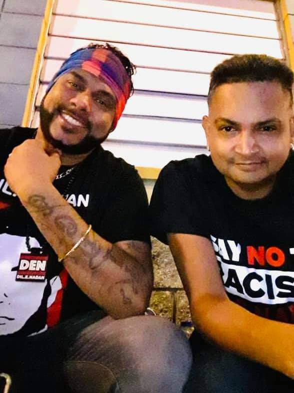 In this photo musician and drummer from the band Dil E Nadan, Anil Soogrim (right) poses for a photo alongside the band's lead singer Raymond Ramnarine. Soogrim died on Sunday morning. Photo courtesy social media -