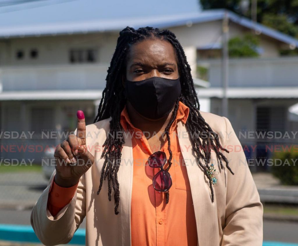FILE PHOTO: Unity of the People political leader Nickocy Phillips shows a stained index finger after voting in the 2020 general election at the Buccoo Community Centre. - 