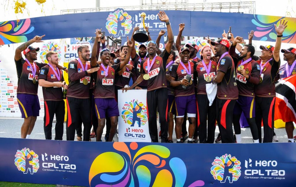 In this Sep 10, 2020 file photo, Trinbago Knight Riders celebrate winning the Hero Caribbean Premier League 2020 against the St Lucia Zouks, at the Brian Lara Cricket Academy,Tarouba. TKR open their defence of the CPL title against Guyana Amazon Warriors, on Thursday, at Warner Park, St Kitts. - via CPL T20 