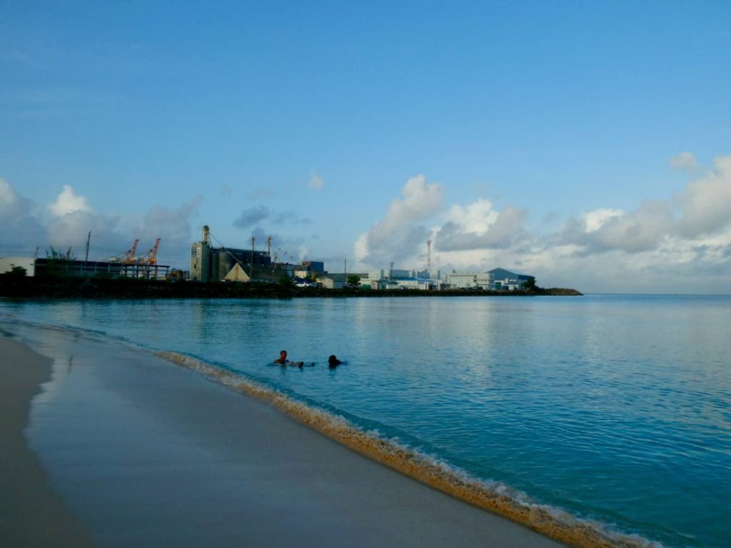 A view of Brighton Beach with its coralline sand on the southwest coast of Barbados, In the background is the Barbados Flour Mills. - PAT GANASE