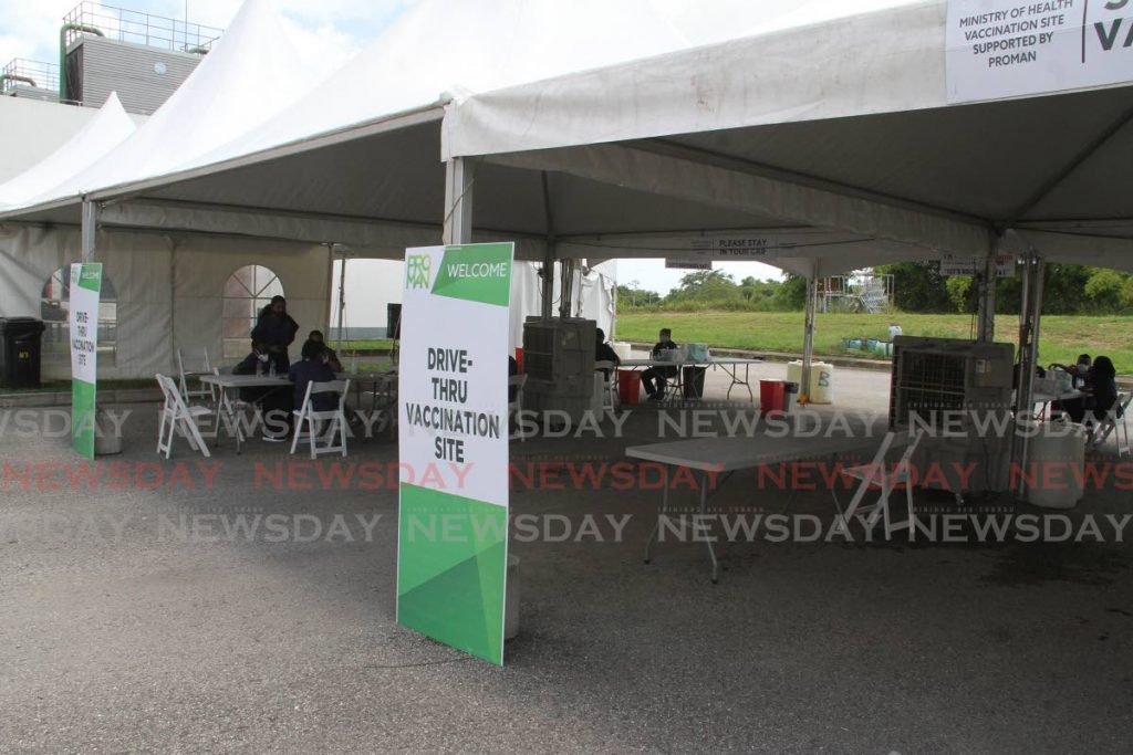 The drive-through  vaccination site at Ato Boldon stadium, Couva, was practically empty on Wednesday, as the rush for vaccine has slowed down. - Photo by Angelo Marcelle