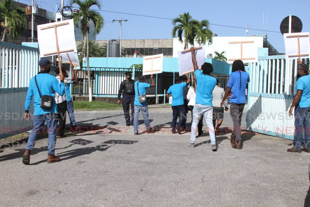 In this August 5 2021 file photo, WASA workers protest outside the organisation's main office in St Joseph.