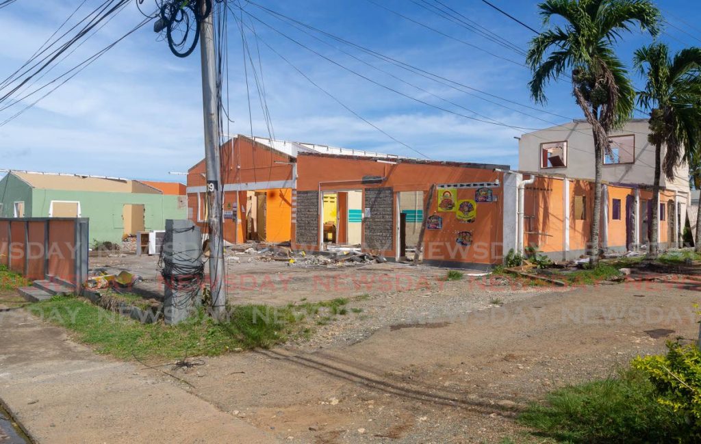 The roofs of several buildings on Store Bay Local Road were ripped off as work continued on the ANR Robinson International Airport expansion project.  - Photo by David Reid