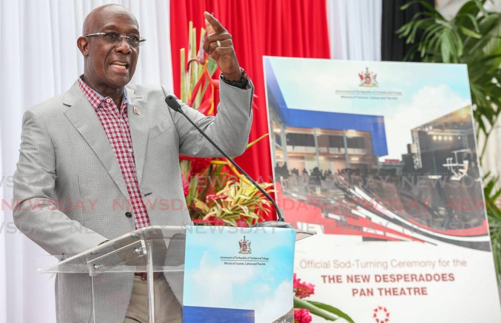 Prime Minister Dr Keith Rowley speaks at the sod-turning ceremony for the new Desperadoes pan theatre at Nelson Street, Port of Spain on Tuesday. - Photo by Jeff Mayers