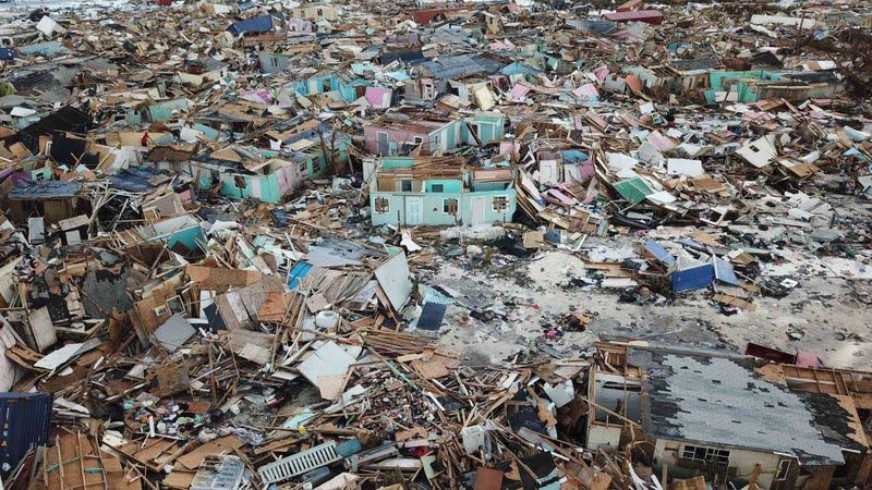 Houses flattened by Hurricane Dorian in Abaco Island of Bahamas in 2019. The island was submerged by the water being dumped. The infrastructure of the island was wiped out. Seventy lives were lost, and to this day, over 200 people are still “missing.” (AP Photo) - 