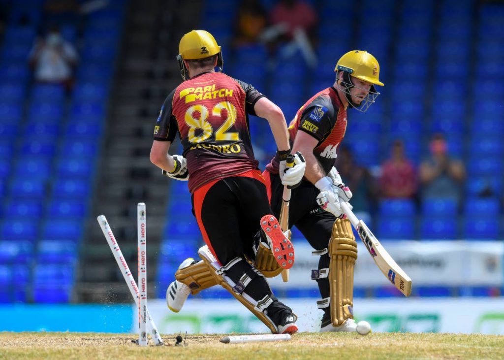 Colin Munro (L) and Tim Seifert (R) of Trinbago Knight Riders are not out after Andre Fletcher of Saint Lucia Kings run out attempt during the 2021 Hero Caribbean Premier League match 7 between Saint Lucia Kings and Trinbago Knight Riders at Warner Park Sporting Complex on Sunday, in Basseterre, St Kitts. - via CPL T20