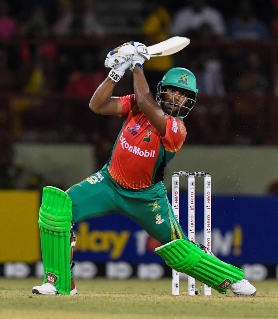 In this Sep 8, 2019 handout image provided by CPL T20, Nicholas Pooran of Guyana Amazon Warriors hits a six during match 6 of the Hero Caribbean Premier League against Barbados Tridents at Guyana National Stadium, in Provdence,Guyana.  - via CPL T20