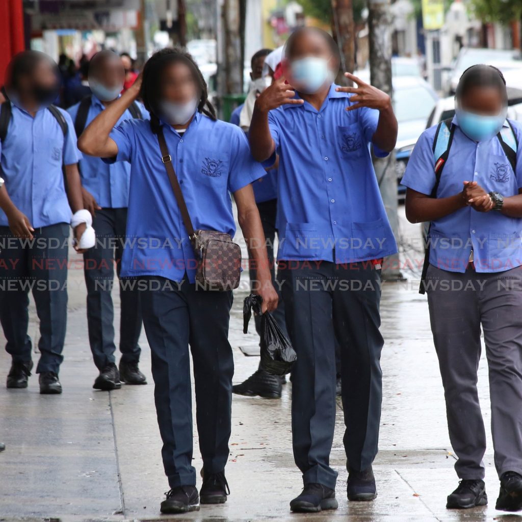 File photo: Secondary schoolboys in Port of Spain. Their faces are blurred to protect their identities.