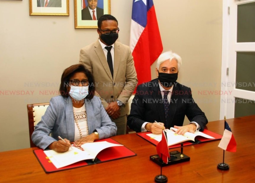 Trade and Industry Minister Paula Gopee-Scoon, from left, Foreign and Caricom Affairs Minister Dr Amery Browne, and Chilean Ambassador Juan Anibal Barria Garcia, at the signing of the general framework for the partial scope trade agreement between the Trinidad and Tobago and Chile at the Foreign and Caricom Affairs Ministry, Port of Spain on October 20, 2020. File photo/Roger Jacob