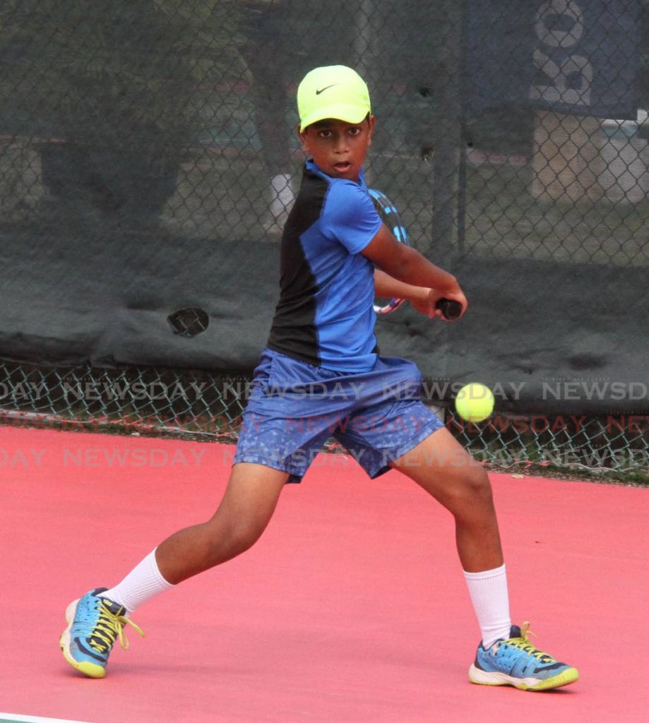  Brian Harricharan lost  0-6, 0-6 to Bermuda' Jaden Jones, during the boys' singles match, at the International Tennis Federation (ITF)/ Central American and Caribbean Tennis Confederation (COTECC) Sub Region 3 & 4 12-and-Under Team Competition in Dominican Republic on Wednesday. - Angelo Marcelle