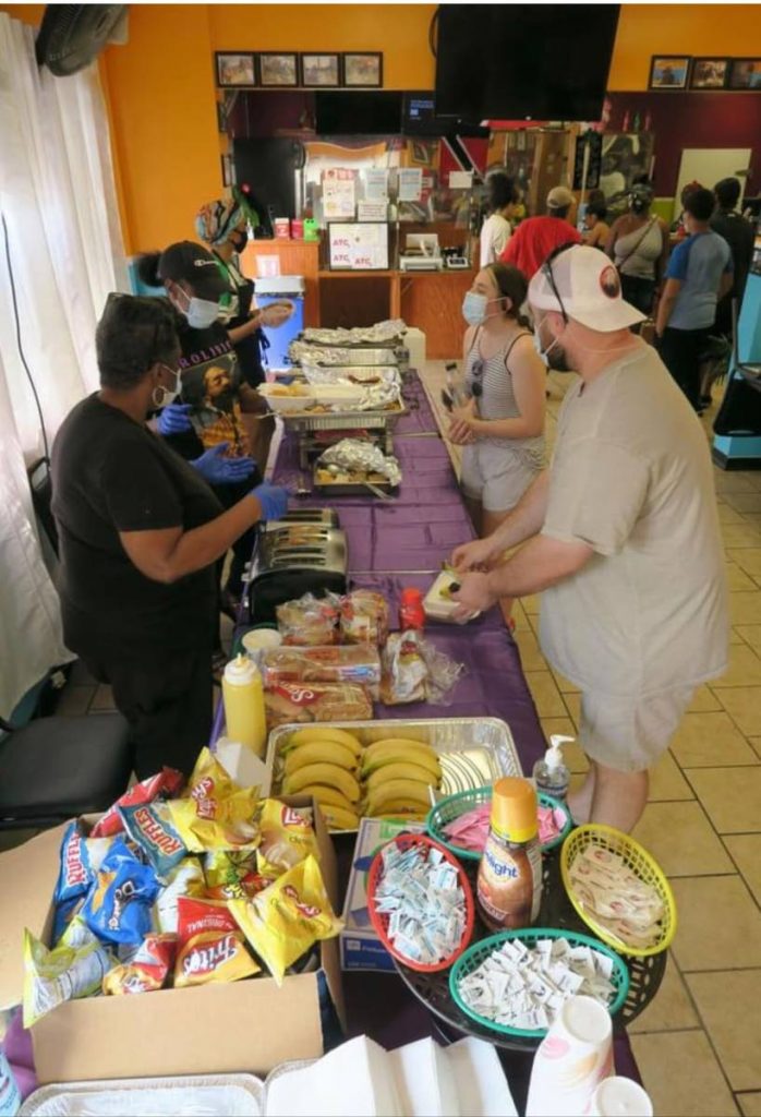 Volunteers at the food drive hosted by the owners of Island Paradise Restaurant and Grill. - Photos courtesy: Nadine Balbosa