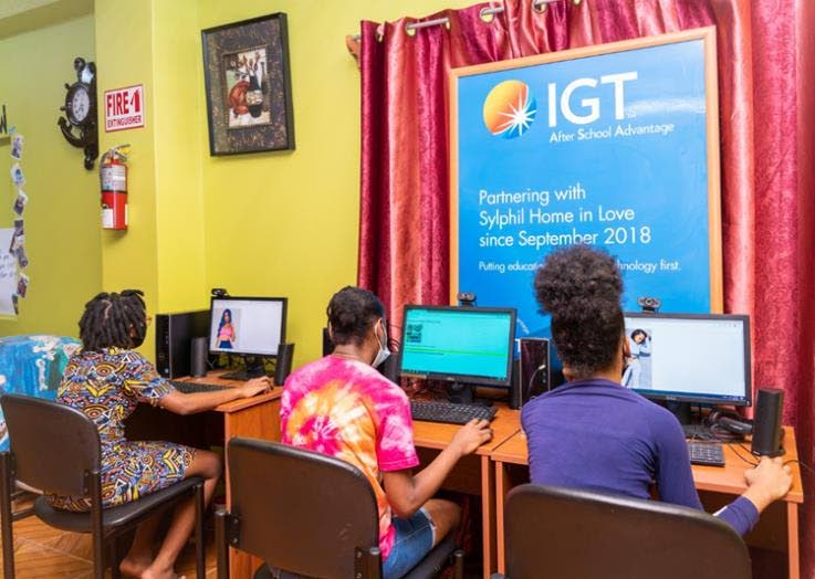 Students at the Sylphil Home in Love, Tobago enjoy using coding to create their very own personalised webpages. - 