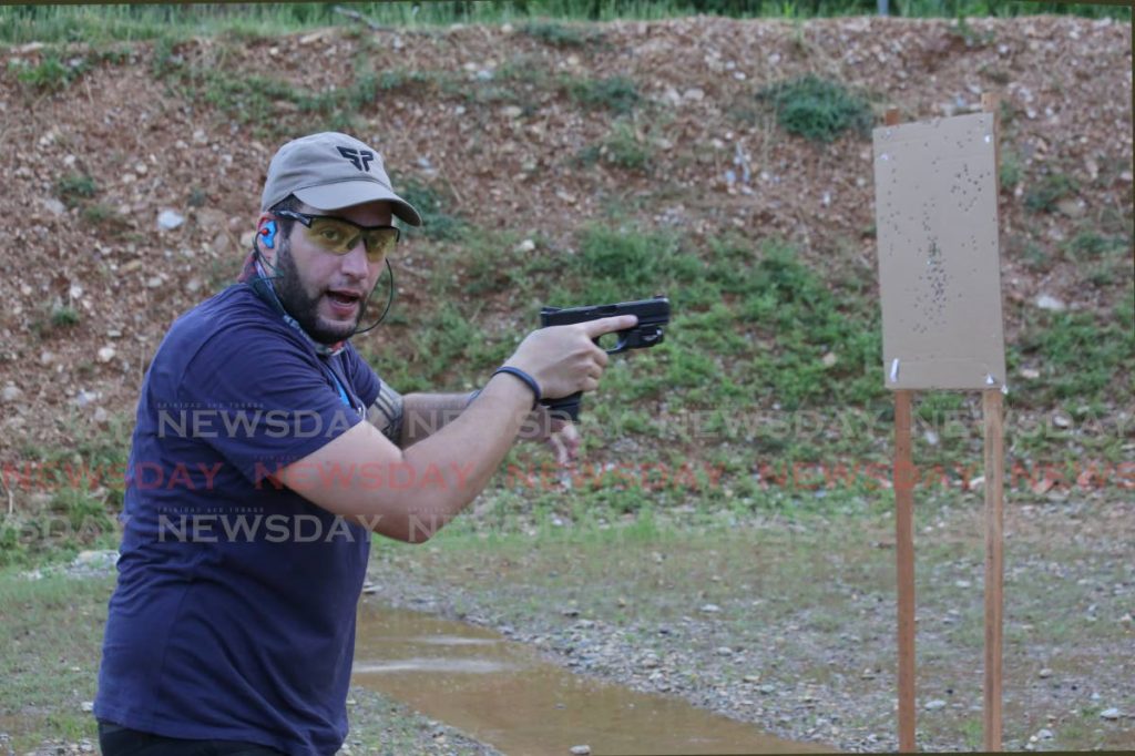 Certified firearm instructor Paul Nahous at MH Tactical Training Resort in Chaguaramas. Nahous says a basic rule of safety is to know what you are shooting at and what is beyond the target. - Photo by Sureash Cholai