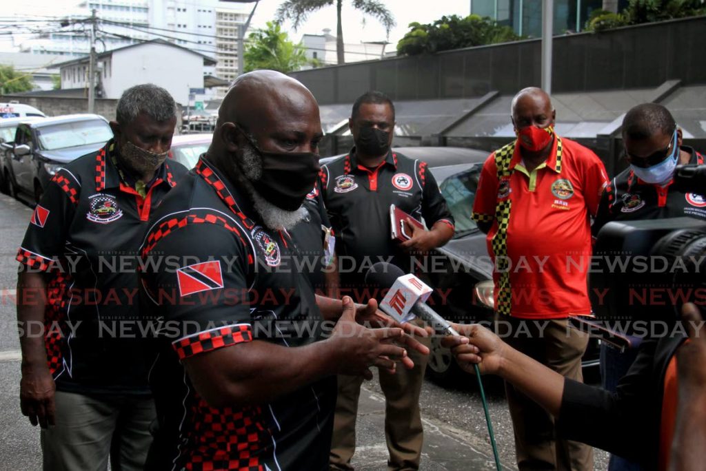 TAXI TALKS: President of the TT Taxi Network Adrian Acosta speaks with reporters outside the Ministry of Works and Transport in Port of Spain on Tuesday. PHOTO BY AYANNA KINSALE - 