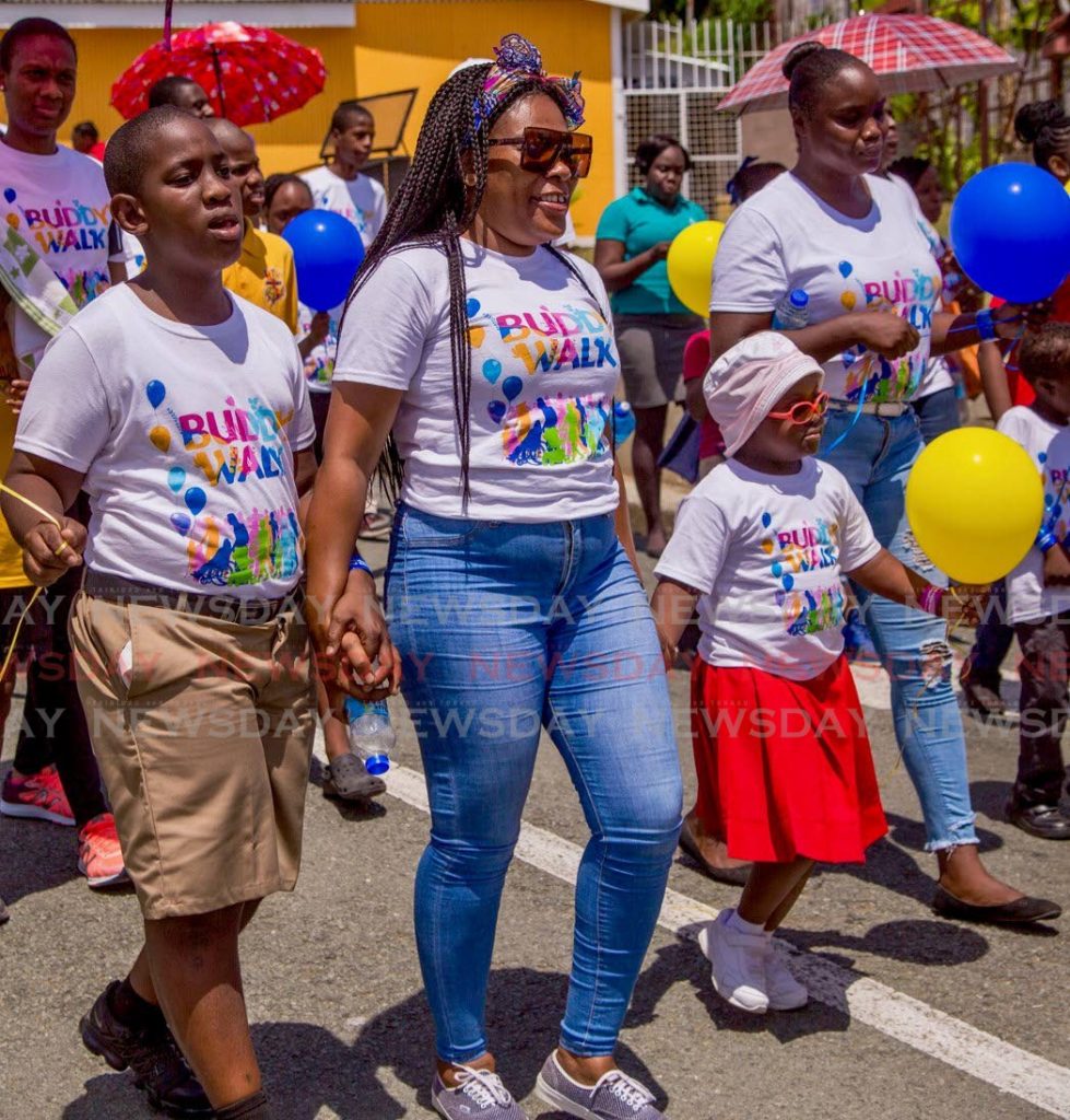 Participants at the Down Syndrome Family Network's Buddy Walk  from Tamarind Square to the Scarborough Esplanade, Tobago in September 2019.  - DAVID REID 