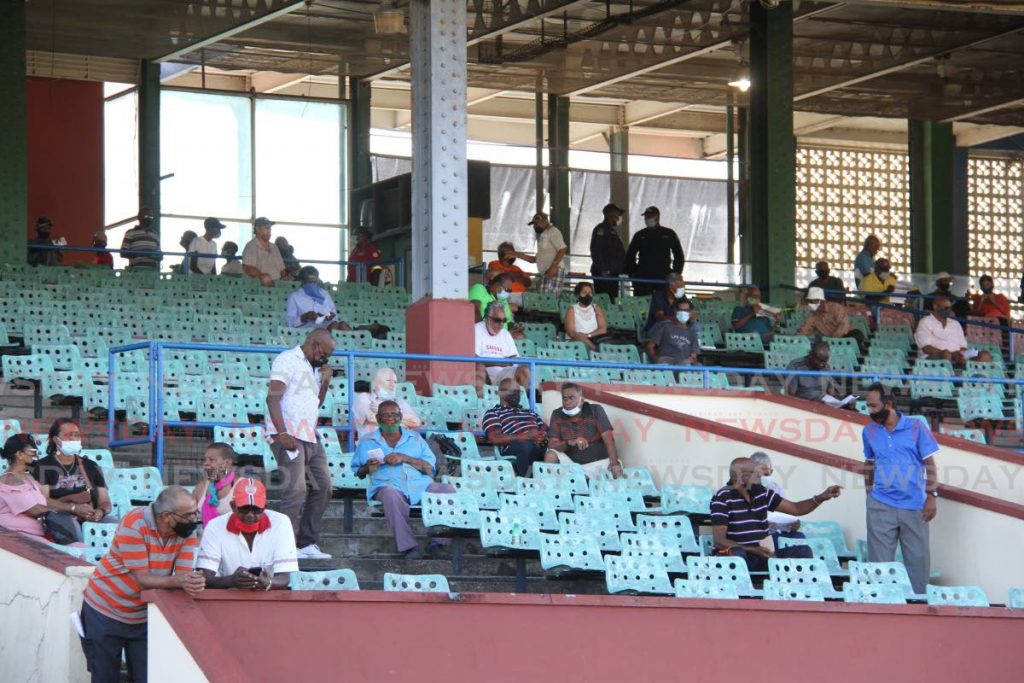 A small number of horse racing fans at the Santa Rosa Park, Arima. - Angelo Marcelle