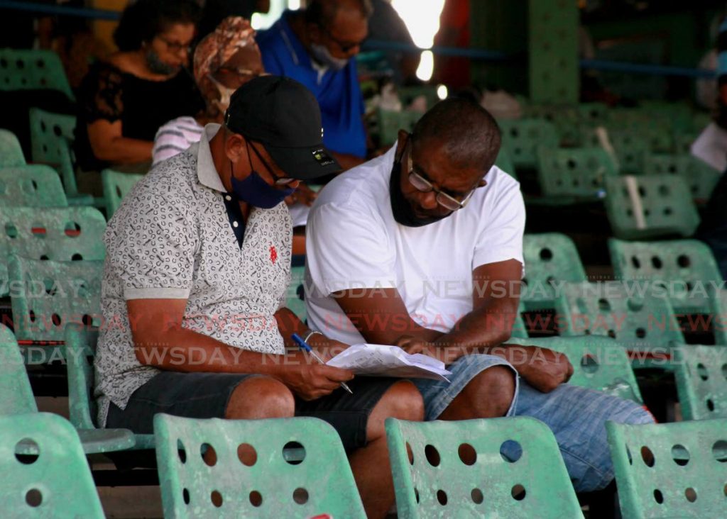 A few fans in the stands at the Santa Rosa Park, Arima, for the National Flour Mills (NFM) Champagne Stakes, in this April 3, 2021 file photo.  - ROGER JACOB