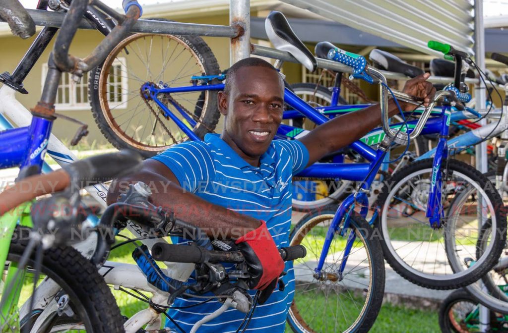 Damian Stewart, owner of Easy Goers Bicycle Rentals, at his Store Bay Local Road business.  Photo by David Reid