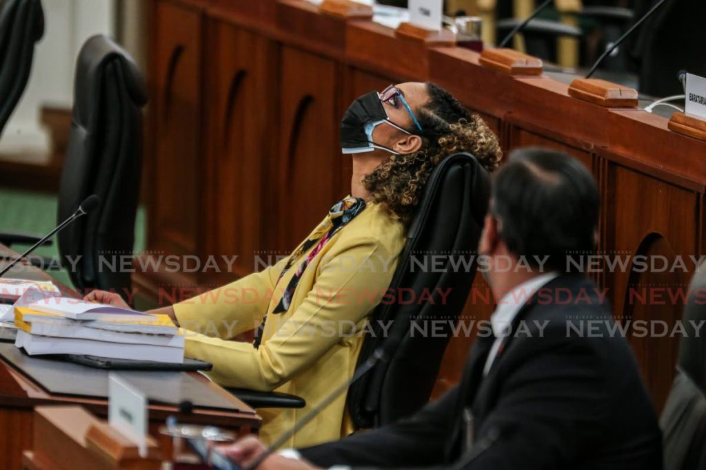 MP Khadija Ameen appears to be bored during the contribution made by MP Kennedy Richards on the 2021/2022 budget debate in Parliament on Saturday. - Jeff Mayers