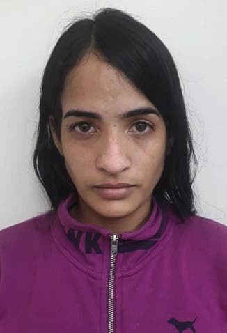 CHARGED: Venezuelan Maria Montano who has been with possession of a fraudulent document and uttering a forged document. PHOTO COURTESY TTPS - 