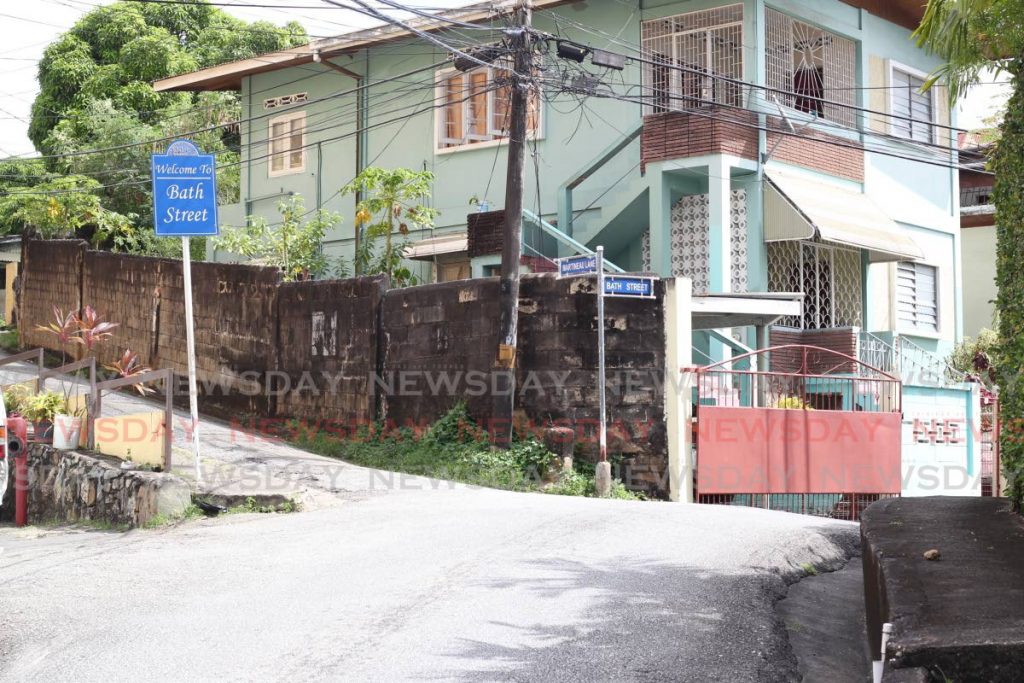 NO ONE OUTSIDE: Bath Street in East Port of Spain is deserted on Wednesday morning hours after one of its residents, garbage collector Nizam Ali Cadette, was gunned down on Laventille Road while doing his job. PHOTO BY ROGER JACOB  - 