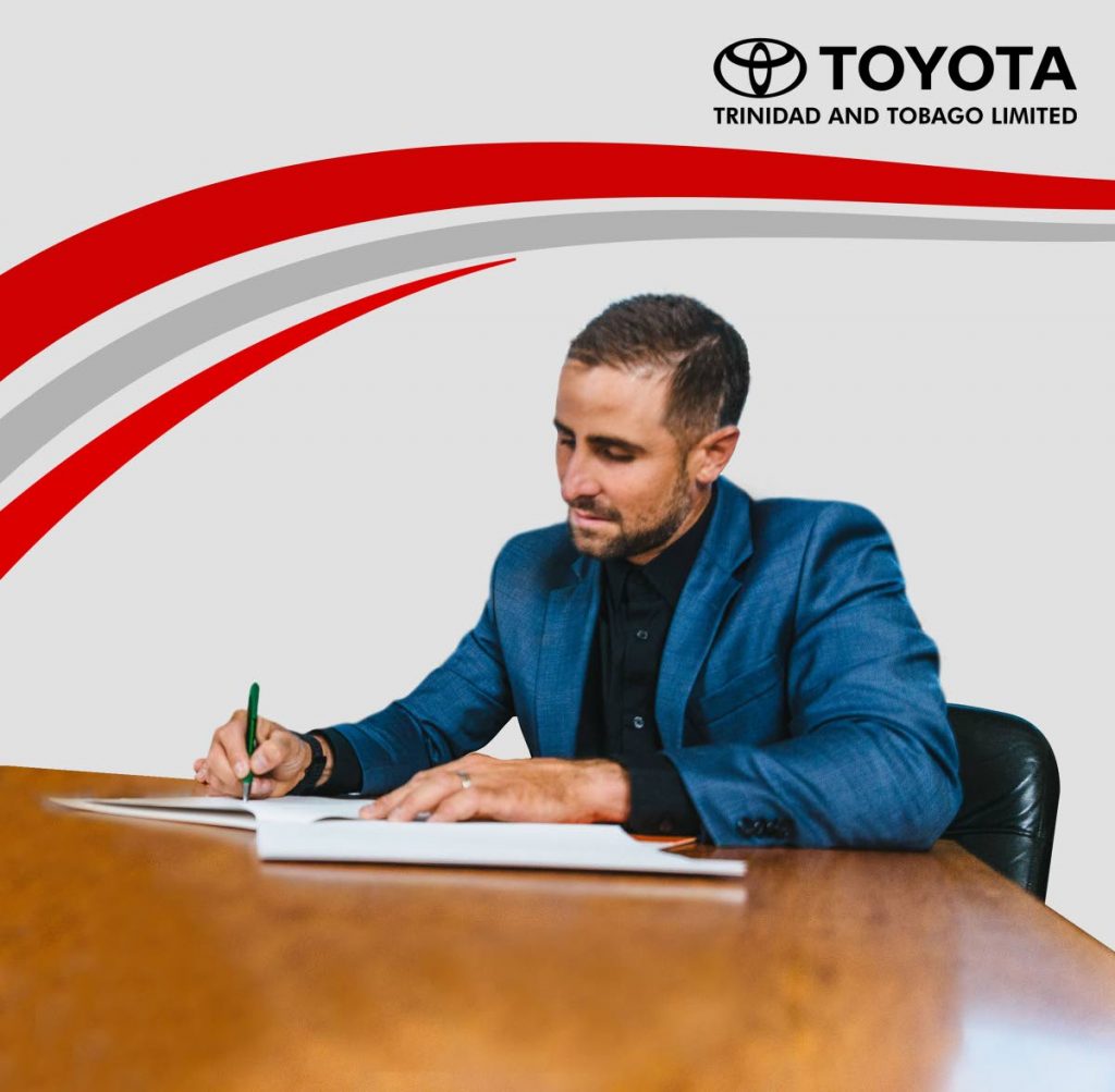 TT sailor and three-time Olympian Andrew Lewis signs a one-year sponsorship deal with Toyota Trinidad and Tobago Ltd.   - Photo courtesy Toyota Trinidad and Tobago