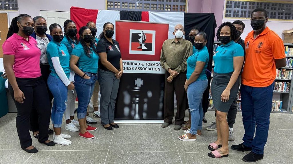 Local chess president Sonja Johnson, centre left, with colleagues and members of the women’s prison chess team.  - Courtesy TT Chess Association