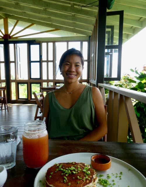 Rheanna Chen chooses cassava pancakes at the Farm House Cafe. Photo by Pat Ganase