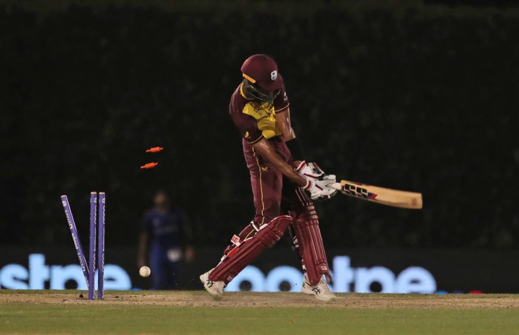 West Indies' Roston Chase is bowled by Afghanistan's Hamid Hassan on a no ball during the ICC Twenty20 World Cup warm-up match in Dubai, UAE, on Wednesday. (AP Photo) 