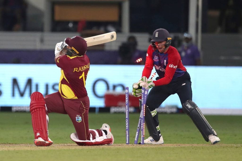 West Indies' Ravi Rampaul is clean bowled by England's Adil Rashid during the T20 World Cup match  at the Dubai International Cricket Stadium, in Dubai, UAE, on Saturday. (AP Photo) - 